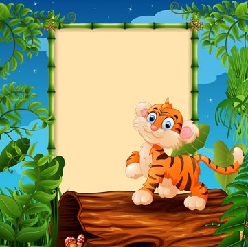Cartoon tiger on hollow log near the empty framed signboard 
