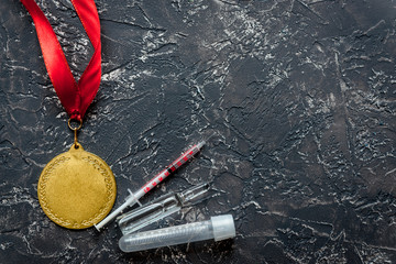 Concept of doping in sport - deprivation medals top view