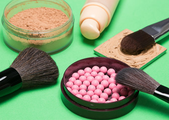 Foundation, powder, blush with makeup brushes