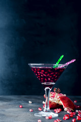 pomegranate cocktail and ripe red fruit