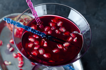 pomegranate cocktail and ripe red fruit