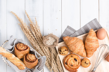 Homemade breads or bun on wood background