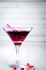 pomegranate cocktail and ripe red fruit