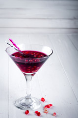 pomegranate cocktail and ripe red fruit