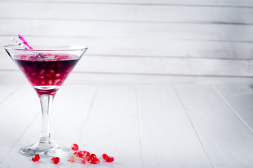 pomegranate cocktail and ripe red fruit