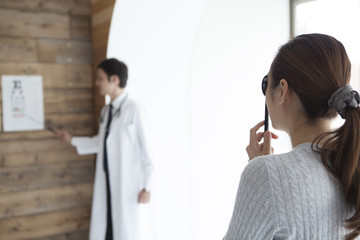 Fototapeta premium Women are doing sight tests with occluder