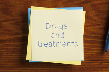Drugs and treatments written on a note