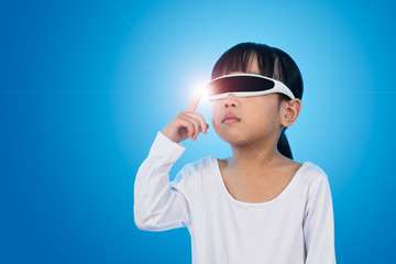 Asian Chinese little girl with futuristic eyeglassses in isolate