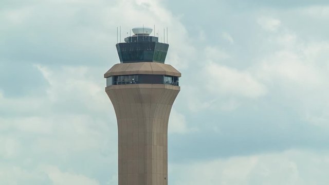 Air Traffic Control Tower Close-up of Houston TX George Bush Intercontinental Airport IAH with Radar and Communication Satellite Day Exterior Building