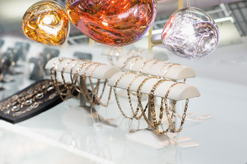 Golden bracelets and shiny bubbles