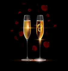 two rings and glasses of champagne