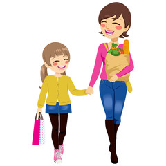 Fototapeta na wymiar Beautiful mom with grocery paper bag and daughter shopping together helping parent holding bags