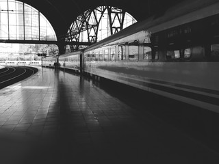 Train station, the train and the platform, black and white photo