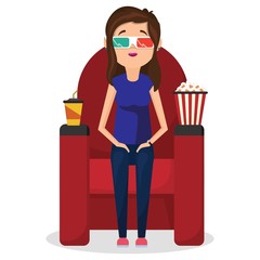 Girl sitting in cinema and watching movie