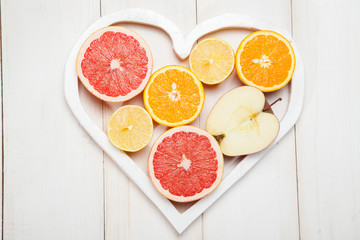 Fruit in a heart on  white background