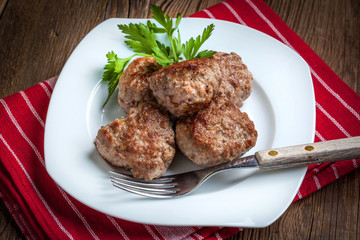 Meatball with parsley.
