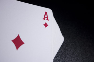 poker card stack deck on dark black background