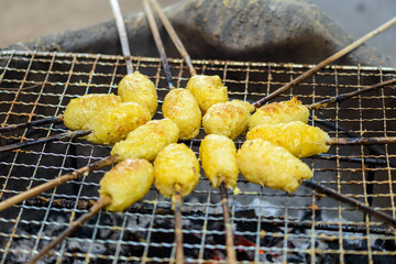 Sticky rice with egg grilled Asian traditional food, Kgawhie.