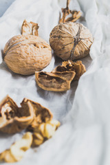 Walnuts and shells on a light background