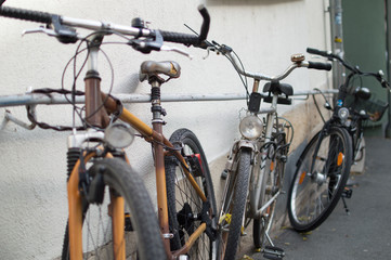 Fototapeta na wymiar Some bikes at the wall in Jena Germany