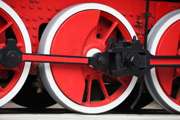 red wheel of an old steam locomotive