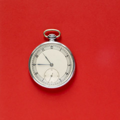 Vintage round watches on red