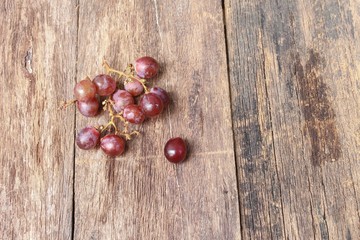 Grape red fresh on wooden table background,Top view