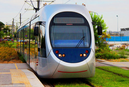 Modern light electric tram on the move, Athens, Greece