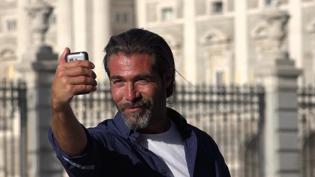 Male Tourist Taking Selfy