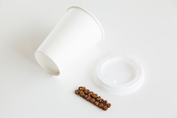 Blank coffee cup and grain on white background. Template for design presentations. Branding Mock-Up.