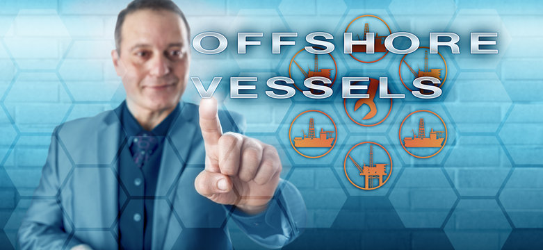 Happy Male Manager Activating OFFSHORE VESSELS