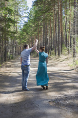 Fototapeta premium Couple in love walking in the woods.