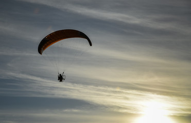 wind-surfing at sunset