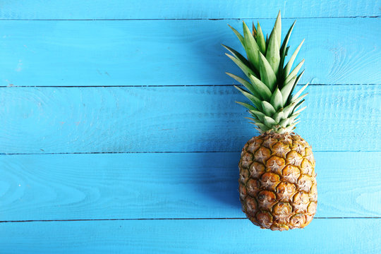 Ripe Pineapple On A Blue Wooden Table