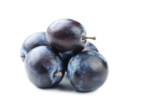 Tasty and ripe plums isolated on a white
