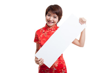 Asian girl in chinese cheongsam dress with  red blank sign.