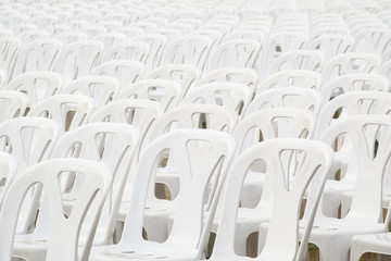 Obraz premium Plastic chair / Abstract background of plastic white chair. Shallow depth of field.