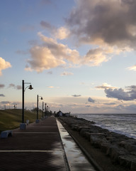 Sunset, on promenade of Mediterranean Sea, winter, Haifa, Israel