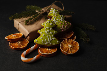 Gingerbreads with a ribbon on a wooden christmas table