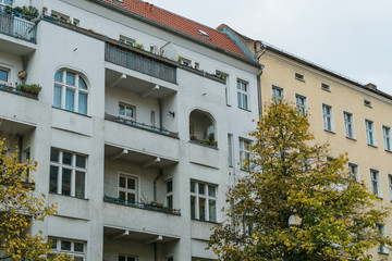 Fototapeta na wymiar yellow and white buildings with big balconies