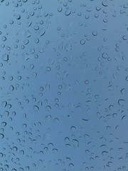 Melt water drops on glass - 131655153