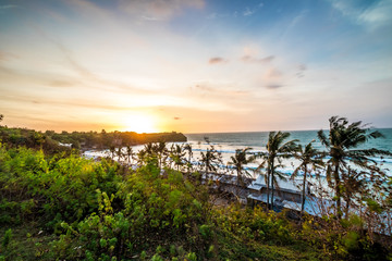 Fototapeta na wymiar Sunset over ocean, nature composition. Beautiful tropical view. Bali island, Indonesia. Balangan beach.
