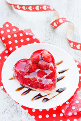 Strawberry cake shaped heart romantic dessert on Valentine Day