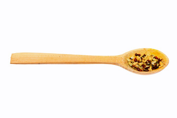 universal spices in wooden spoon