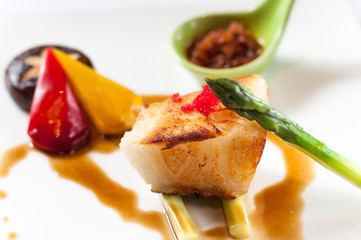 Fried cod with asparagus