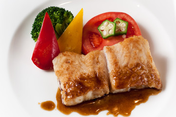 Fried fish with onion sauce