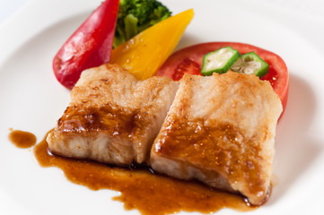 Fried fish with onion sauce