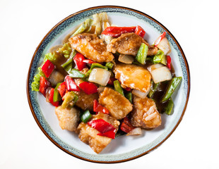 Fried bream with pepper, onion