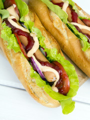 hot dogs on a wooden table