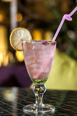 Pink drink with lemon